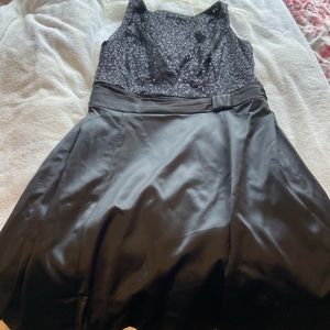 Black cocktail dress. Size 14. Very fun sparkly little dress.